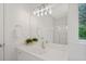 Bathroom featuring a shower with glass doors and white quartz countertops at 112 Birchwood Pass, Canton, GA 30114