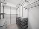 Walk-in closet featuring wire shelving and built-in drawers at 112 Birchwood Pass, Canton, GA 30114