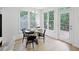 Cozy dining area with backyard views and hardwood floors at 112 Birchwood Pass, Canton, GA 30114