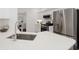 Bright kitchen featuring stainless steel appliances, white cabinets, and a quartz countertop at 112 Birchwood Pass, Canton, GA 30114
