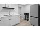 Modern kitchen with stainless steel appliances, sleek cabinetry, and ample countertop space at 112 Birchwood Pass, Canton, GA 30114