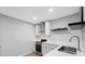 Well-lit kitchen with modern appliances and cabinetry and lots of counter space at 112 Birchwood Pass, Canton, GA 30114