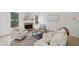 Comfortable living room with fireplace and lots of natural light at 112 Birchwood Pass, Canton, GA 30114