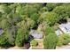 Aerial view of wooded lot showcasing the home's privacy and surrounding trees at 170 Mayfield Cir, Alpharetta, GA 30009