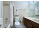 Bathroom featuring shower-tub combo with shower curtain, toilet, and vanity with sink at 170 Mayfield Cir, Alpharetta, GA 30009