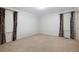 Spacious bedroom featuring plush carpet, crown molding, and natural light with large windows at 170 Mayfield Cir, Alpharetta, GA 30009