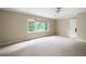 Spacious bedroom with large windows offering ample natural light at 170 Mayfield Cir, Alpharetta, GA 30009