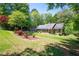Charming one story home with a well-manicured lawn and mature trees in a tranquil setting at 170 Mayfield Cir, Alpharetta, GA 30009
