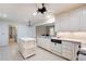 Functional kitchen featuring white cabinetry, an island, and modern appliances at 170 Mayfield Cir, Alpharetta, GA 30009