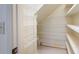 Walk-in pantry with ample shelving space for organized storage at 170 Mayfield Cir, Alpharetta, GA 30009