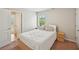 Bright bedroom with neutral paint, carpet floors, and an attached bathroom at 2100 Baywood Sw Blvd, Austell, GA 30106