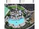 Aerial view of resort-style pool with cabanas, dining, playground and other amenities at 6520 Pond View Dr, Cumming, GA 30028