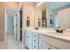 Elegant bathroom with double vanity, marble countertops, and stylish tile flooring at 79 Little Creek Manor Dr, Dallas, GA 30157