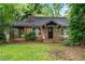 Charming brick home nestled among trees, offering a welcoming and private setting at 944 Deckner Sw Ave, Atlanta, GA 30310
