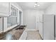 Functional kitchen with stainless steel sink and compact appliances, offering practicality at 944 Deckner Sw Ave, Atlanta, GA 30310