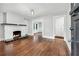 Bright living room with a brick fireplace and hardwood floors, exuding character at 944 Deckner Sw Ave, Atlanta, GA 30310