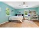Bright bedroom with a ceiling fan, bed, and door leading to a balcony at 141 Mills Creek Path, Hiram, GA 30141