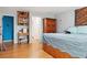 The bedroom features hardwood floors and soft, neutral wall colors at 141 Mills Creek Path, Hiram, GA 30141