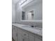 Bright bathroom vanity with granite counters and a large mirror at 2173 Martin Way, Jonesboro, GA 30236