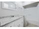 Bathroom featuring granite counters and shower at 2173 Martin Way, Jonesboro, GA 30236