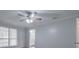 Bedroom with neutral walls, ceiling fan and window at 2173 Martin Way, Jonesboro, GA 30236