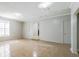 Open living room with tile floors, natural light from the windows, and access to the backyard at 2173 Martin Way, Jonesboro, GA 30236