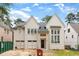 Beautiful two-story home with painted brick and hardiplank siding and a three-car garage at 2991 Surrey Ln, Atlanta, GA 30341
