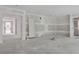 Unfinished living room with large windows and open concept floor plan at 2991 Surrey Ln, Atlanta, GA 30341