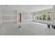 Unfinished living room with large windows allowing ample natural light in the home at 2991 Surrey Ln, Atlanta, GA 30341