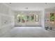 Unfinished living room with large windows allowing ample natural light in the home at 2991 Surrey Ln, Atlanta, GA 30341