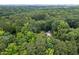 Aerial view showcasing the community and lush greenery surrounding the home at 3345 Bomar Rd, Douglasville, GA 30135