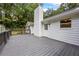 Wooden back deck with black railings looking out onto lawn at 3345 Bomar Rd, Douglasville, GA 30135
