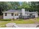 Exterior shot of a backyard with small shed, lawn and home at 3345 Bomar Rd, Douglasville, GA 30135