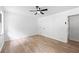 Bright bedroom with wood floors, ceiling fan, and natural light at 3345 Bomar Rd, Douglasville, GA 30135