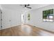 Airy bedroom features wood floors, natural light, and private bath at 3345 Bomar Rd, Douglasville, GA 30135