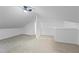 Spacious bonus room offering vaulted ceilings, neutral carpet, and ample room for a variety of uses at 3345 Bomar Rd, Douglasville, GA 30135