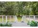 Beautiful front porch features plants and stylish railing at 3345 Bomar Rd, Douglasville, GA 30135