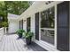 View of front porch, windows, and siding at 3345 Bomar Rd, Douglasville, GA 30135