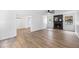 Open-concept living room with a fireplace and views into the dining area at 3345 Bomar Rd, Douglasville, GA 30135