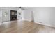 Cozy living room features a modern fireplace, ceiling fan and beautiful flooring at 3345 Bomar Rd, Douglasville, GA 30135