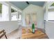 Charming screened porch with stylish outdoor seating, perfect for relaxing at 3345 Bomar Rd, Douglasville, GA 30135