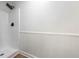 Walk-in shower stall and wainscotting in bathroom of home for sale at 3345 Bomar Rd, Douglasville, GA 30135