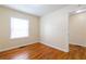Cozy bedroom with hardwood floors and a bright window at 3349 Lavista Dr, Atlanta, GA 30354