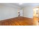 Bedroom featuring hardwood floors with views into the kitchen and bathroom at 3349 Lavista Dr, Atlanta, GA 30354