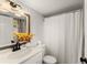 Bathroom with vanity, modern fixtures, and shower with curtain at 1101 New Horizon St, Powder Springs, GA 30127