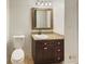 Cozy bathroom with granite countertop, classic vanity, and storage at 2784 Williamsburg Way, Decatur, GA 30034