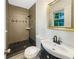 Bathroom with tile shower, vanity, and modern fixtures at 2784 Williamsburg Way, Decatur, GA 30034