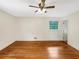 Bright bedroom with hardwood floors, a ceiling fan, and large windows at 2784 Williamsburg Way, Decatur, GA 30034