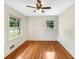 Bedroom with hardwood floors and natural light from multiple windows at 2784 Williamsburg Way, Decatur, GA 30034