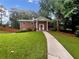 Charming brick home with a well-manicured lawn and inviting walkway at 2784 Williamsburg Way, Decatur, GA 30034
